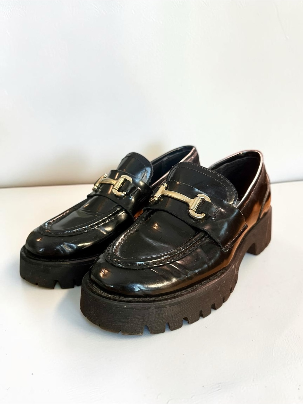 Steve Madden Black Patent Lug Sole Loafers with Gold Bit